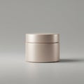A minimalist, beige, cylindrical container with a matte finish sits centered on a Royalty Free Stock Photo