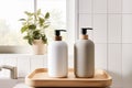 minimalist beige and white liquid soap dispensers in interior setting