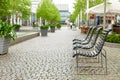 Minimalist benches for relaxing in the alley of the city Royalty Free Stock Photo