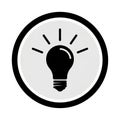 Black Light Bulb Icon with Rays of Light Inside a Circle on White Background idea innovation Royalty Free Stock Photo