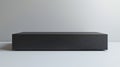 A minimalist black plinth with clean sharp lines ideal for highlighting minimalist objects