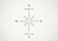 A minimalist black and white compass rose design features eight points. The primary directions are Royalty Free Stock Photo