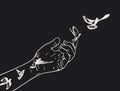 A minimalist black and white illustration depicting a hand releasing birds into the sky Royalty Free Stock Photo