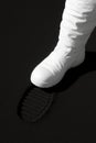 Minimalist black and white image of an astronaut\'s first step on a new planet Royalty Free Stock Photo