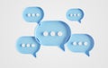 Minimalist blue speech bubbles talk icons floating over white background. Modern conversation or social media messages with shadow Royalty Free Stock Photo