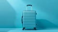Minimalist blue turquoise suitcase mockup on solid background, ai generated Royalty Free Stock Photo