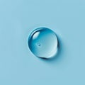 Minimalist blue water droplet on a smooth surface
