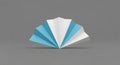 Minimalist Blue and White Folded Paper Fan on Gray Background Royalty Free Stock Photo