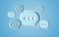 Minimalist blue and white speech bubbles talk icons floating over background. Modern conversation or social media messages with Royalty Free Stock Photo