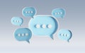 Minimalist blue and white speech bubbles talk icons floating over grey background. Modern conversation or social media messages Royalty Free Stock Photo