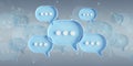 Minimalist blue and white speech bubbles talk icons floating over grey background. Modern conversation or social media messages Royalty Free Stock Photo