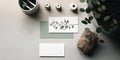 Minimalist branding, business card mockup with a stack of cards in a small bowl, boho necklace and eucalyptus twigs Royalty Free Stock Photo