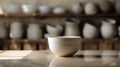 Minimalist ceramic bowl with natural lighting in a workshop Royalty Free Stock Photo