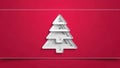 Minimalist white layered paper cut Christmas tree on a bold red background Royalty Free Stock Photo