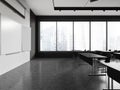 Minimalist classroom interior with desk in row and mockup blackboard, window Royalty Free Stock Photo