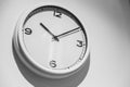 Minimalist Clock or Simple white clock hang on white wall Royalty Free Stock Photo