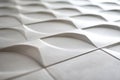 Minimalist close-up of a premium ceramic tile with clean geometric pattern captured under soft lighting, showing interior design Royalty Free Stock Photo