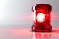 Minimalist close-up of red emergency alarm beacon in modern setting Royalty Free Stock Photo