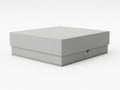 Minimalist closed gray cardboard box on white surface Royalty Free Stock Photo