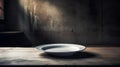 Empty white plate on a wooden table Royalty Free Stock Photo