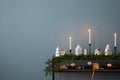 Minimalist composition of christmas interior with copy space, wooden console with sprace, christmas balls, candle with candlestick