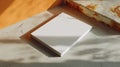 Minimalist Composition Featuring a Blank Book Resting on a Textured Surface with Soft Shadows and Warm Tones Royalty Free Stock Photo