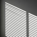 Striped Light and Shadow Pattern on Gray Wall Royalty Free Stock Photo