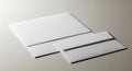 Clean white paper and envelopes stacked on a light gray surface for business or correspondence Royalty Free Stock Photo