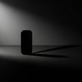 A minimalist composition featuring a single black object, possibly a lighter or a small rectangular Royalty Free Stock Photo