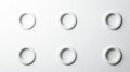 Minimalist composition featuring six circular cutouts in drywall, likely for electrical outlets, arranged in a grid Royalty Free Stock Photo