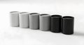 Row of Cylindrical Containers in Grayscale and Black Royalty Free Stock Photo