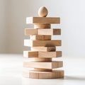 Sculptural composition of balanced wooden blocks and sphere, minimalist design on white background Royalty Free Stock Photo