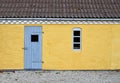 Minimalist composition of a rural house facade, Balance of colors and texture of materials