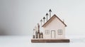 Minimalist composition of a small house model beside Royalty Free Stock Photo