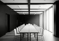 A minimalist conference room with a long table and white chairs, illuminated by natural light Royalty Free Stock Photo
