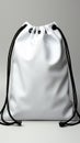 Minimalist contrast white drawstring bag, adorned with a sleek black rope closure