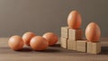 Conceptual Eggs and Wooden Blocks Arrangement Royalty Free Stock Photo
