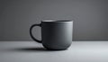 Minimalist Dark Gray Coffee Mug on a Light Surface Royalty Free Stock Photo