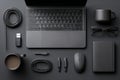 Minimalist Dark Workspace Flat Lay Laptop Tech Gadgets and Office Essentials Royalty Free Stock Photo