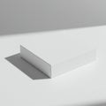 A minimalist design featuring a plain white rectangular box on a light surface Royalty Free Stock Photo
