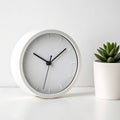 Minimalist desktop clock on white background Royalty Free Stock Photo