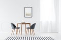 Minimalist dining room with poster Royalty Free Stock Photo