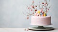 A minimalist Easter Day cake with colorful eggs on top, spring branches banner