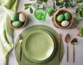 A minimalist Easter table setting with an emphasis on natural materials and a fresh green palette Royalty Free Stock Photo