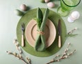 A minimalist Easter table setting with an emphasis on natural materials and a fresh green palette Royalty Free Stock Photo