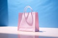 Minimalist and elegance Pink shopping bag on blue background, springtime or summer sale and Valentine surprise offer promotion