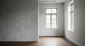 Minimalist Empty Room Featuring Textured Wall and Large Windows Showing Natural Light Inside Royalty Free Stock Photo