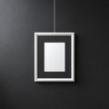 Blank White Picture Frame Mockup on Dark Textured Wall Royalty Free Stock Photo
