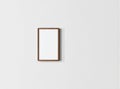 A minimalist frame with neutral tones, placed on a clean, neutral wall. Perfect for showcasing simple framing ideas and room Royalty Free Stock Photo