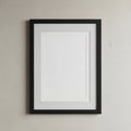 Minimalist framed artwork with a sleek vertical line design displayed on a neutral wall Royalty Free Stock Photo